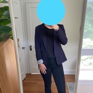 Blue blazer with striped inner sleeve lining